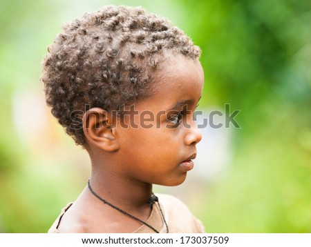 AKSUM, ETHIOPIA - SEP 27, 2011: Portrait of an unidentified Ethiopian cute little boy in Ethiopia, Sep.27, 2011. People in Ethiopia suffer of poverty due to the unstable situation