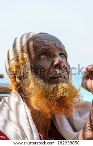 YEMEN, SOCOTRA - JAN 14, 2014: Unidentified man with a red beard on the Socotra Island, Yemen. People of Socotra suffer of poverty
