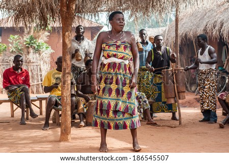 KARA, TOGO - MAR 11, 2012:  Unidentified Togolese woman dance a religious voodoo dance performance. Voodoo is the West African religion