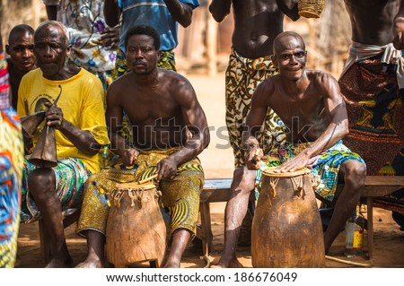 KARA, TOGO - MAR 11, 2012:  Unidentified Togolese drummers make music for the religious voodoo dance performance. Voodoo is the West African religion