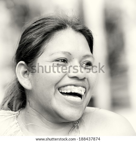 AMAZONIA, PERU - NOV 10, 2010: Unidentified Amazonian indigenous girl laughs. Indigenous people of Amazonia are protected by  COICA (Coordinator of Indigenous Organizations of the Amazon River Basin)