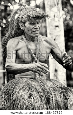 AMAZONIA, PERU - NOV 10, 2010: Unidentified Amazonian indigenous man. Indigenous people of Amazonia are protected by  COICA (Coordinator of Indigenous Organizations of the Amazon River Basin)