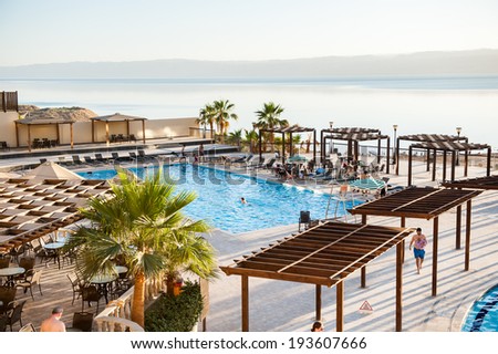 DEAD SEA RESORT, JORDAN - APR 30, 2014: SPA Hotel at the Dead Sea coast in Jordan. Dead Sea water is used for medical purposes for the people with skin problems