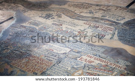 MADABA, JORDAN - APR 28, 2014:  Fragment of the oldest floor mosaic map of the Holy Land and Jerusalem in the Saint George\'s Church. It dates 6th century
