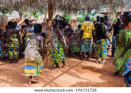 KARA, TOGO - MAR 11, 2012:  Unidentified Togolese women in a traditional dress dance the religious voodoo dance. Voodoo is the West African religion