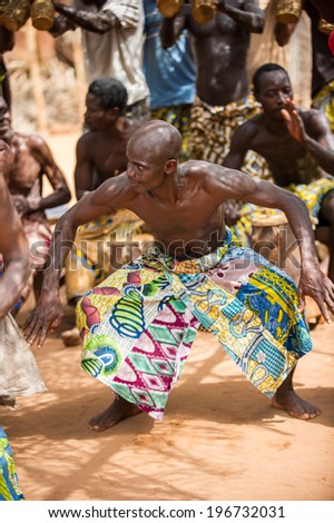 KARA, TOGO - MAR 11, 2012:  Unidentified Togolese man dances the religious voodoo dance. Voodoo is the West African religion