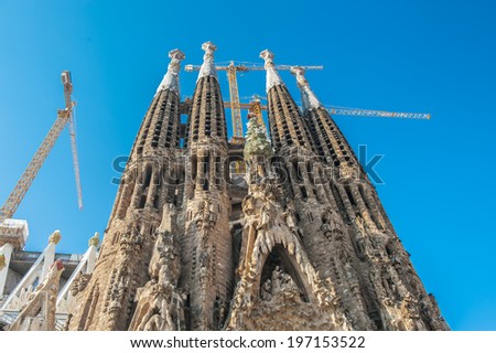 BARCELONA, SPAIN - MAR 15, 2014: Basilica and Expiatory Church of the Holy Family, is a Roman Catholic church in Barcelona, Spain, designed by Antoni Gaudi. UNESCO World Heritage Site