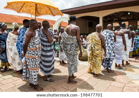 ACCRA, GHANA - MARCH 4, 2012: Unidentified Ghanaian people during the  local street music show in Ghana. People of Ghana suffer of poverty due to the unstable economic situation