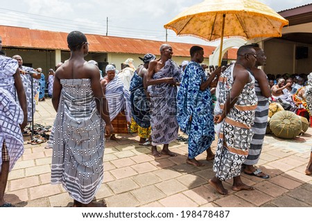ACCRA, GHANA - MARCH 4, 2012: Unidentified Ghanaian people during the  local street music show in Ghana. People of Ghana suffer of poverty due to the unstable economic situation