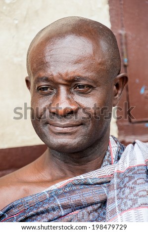 ACCRA, GHANA - MARCH 4, 2012: Unidentified Ghanaian man portrait in Ghana. People of Ghana suffer of poverty due to the unstable economic situation