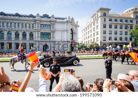 MADRID, SPAIN - JUN 19, 2014: New King of Spain Felipe IV greets the crowd in the centre of Madrid on a day of his inauguration