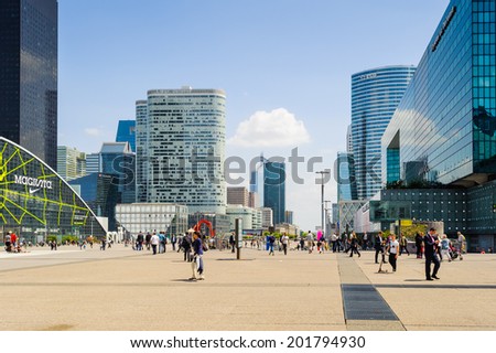 PARIS, FRANCE - JUN 18, 2014: Modern glass architecture of the La Defense district. La Defense is the major business district of the Paris, France
