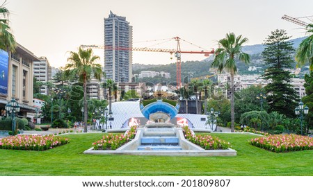 MONTE CARLO, MONACO - JUN 24, 2014: Beautiful metal sphere near the Monte Carlo Casino. Monte Carlo Casino  includes a casino, the Grand Theatre de Monte Carlo. It\'s the main sight of Monte Carlo