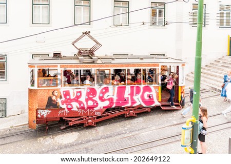 LISBON, PORTUGAL - JUN 20, 2014: Electric tramway in Lisbon, Portugal. Lisbon is the westernmost large city Europe and the seventh-most-visited city in Southern Europe