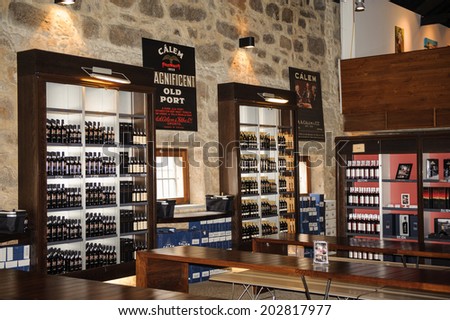 PORTO, PORTUGAL - JUN 21, 2014: Bottles of the port wine of the Calem trademark. Calem company was created in 1859 and now it\'s one of the world brands of the port wines from Porto