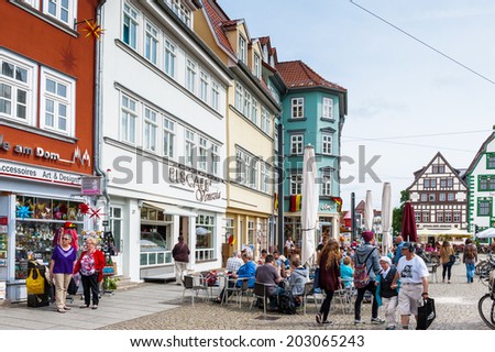 ERFURT, GERMANY  - JUN 16, 2014: Small cafe of the downtown of the city of Erfurt, Germany. Erfurt is the Capital of Thuringia and the city was first mentioned in 742