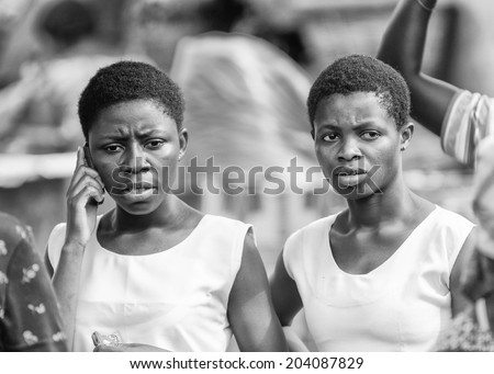 ACCARA, GHANA - MAR 4, 2012: Unidentified Ghanaian two women portrait in black and white. People of Ghana suffer of poverty due to the unstable economical situation