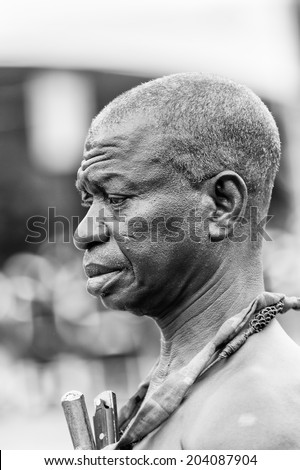 ACCARA, GHANA - MAR 4, 2012: Unidentified Ghanaian old man portrait in black and white. People of Ghana suffer of poverty due to the unstable economical situation