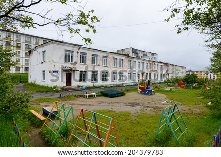 MAGADAN, RUSSIA - JUL 4, 2014: Old Kinder  garden on the Yakutskaya street in Magadan, Russia. Magadan was founded in 1929 and now it\'s the administrative centre of the Magadan region.