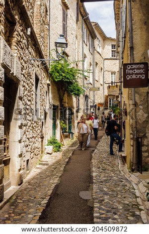 SAINT-PAUL-DE-VENCE, FRANCE - JUN 25, 2014: Old architecture and street of Saint Paul de Vence, one of the oldest towns of the Frence Riviera. Town of painters and galleries