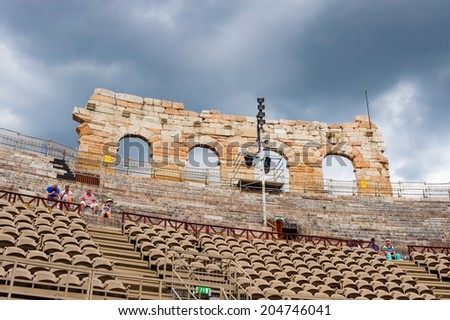 VERONA, ITALY - JUN 26, 2014: Verona Arena (Arena di Verona), a Roman amphitheatre in Piazza Bra in Verona, Italy. It was built in AD 30