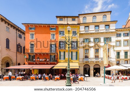 VERONA, ITALY - JUN 26, 2014: Piazza Bra and its restaurants , the largest square in Verona, Italy. City of Verona is a UNESCO World Heritage site