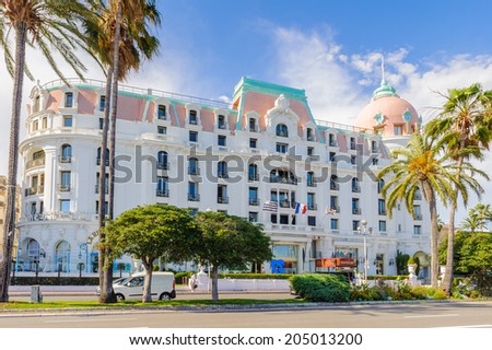 NICE, FRANCE - JUNE 25, 2014: Hotel Negresco, the most luxury and expensive hotel in Nice, Promenade des Anglais, France. Nice is the capital of the Alpes Maritimes departement