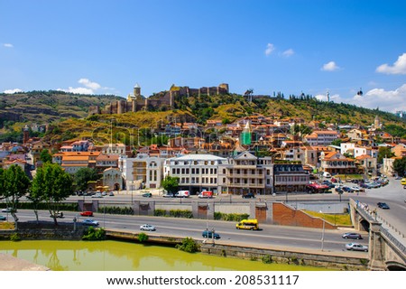 TBILISI, GEORGIA - JULY 18, 2014: Bridge over the river  of Tbilisi, Georgia. Tbilisi is the capital and the largest city of Geogia with 1,5 mln people population