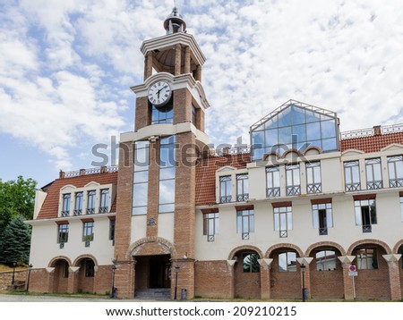 SIGHNAGHI, GEORGIA - JULY 20, 2014: Clock tower building in Sighnaghi, Georgia. Sighnaghi is a popular touristic destination in Georgia and also the capital of wine and carpet indusry