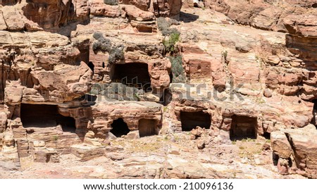 Caves in the rocks of  Petra, the capital of the kingdom of the Nabateans in ancient times. UNESCO World Heritage