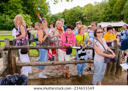 PLITVICE LAKE NATIONAL PARK, CROATIA - AUG 19, 2014: Unidentified people in  getting on board in the Plitvice Lakes National Park, which is a UNESCO World Heritage site