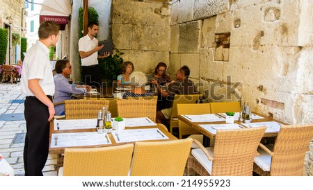SPLIT, CROATIA - AUG 22, 2014: Restaurant in Historical Complex in Split, Croatia. Historical Complex of Split is UNESCO World Heritage