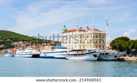 SPLIT, CROATIA - AUG 22, 2014: Harbor of Split, Croatia. Split is the largest city of the region of Dalmatia and a popular touristic destination