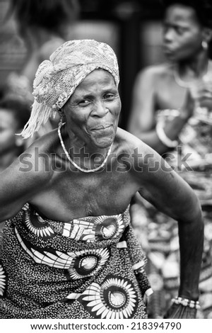 KARA, TOGO - MAR 9, 2013: Unidentified Togolese woman dances a local dance. People in Togo suffer of poverty due to the unstable econimic situation