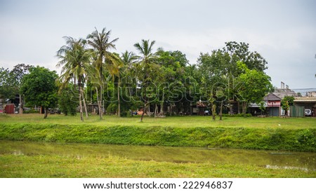 SIEM REAP, CAMBODIA - SEP 28, 2014: Nature and houses in Siemreap region, Cambodia. Siem Reap is the capital city of Siem Reap Province and a popular resort town as the gateway to Angkor region