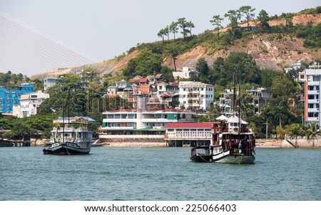HA LONG CITY, VIETNAM - SEP 23, 2014: Port of the Halong city where many touristic boat start jorneys over the Halong bay which is UNESCO World heritage