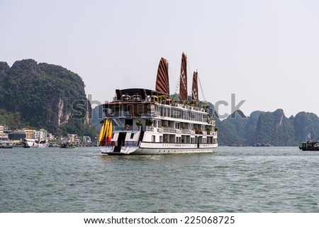 HA LONG CITY, VIETNAM - SEP 23, 2014: Touristoc Boats near the port of the Halong city where many touristic boats start jorneys over the Halong bay which is UNESCO World heritage