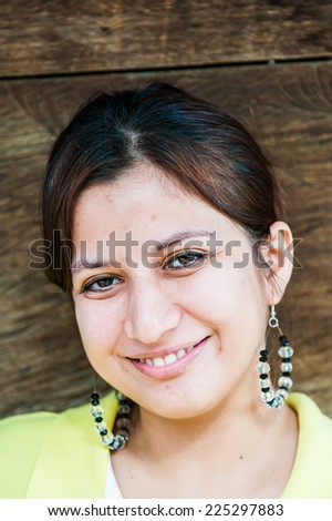GUATEMALA CITY, GUATEMALA - JANUARY 1, 2012: Portrait of unidentified smiling girl in Guatemala, Jan 1, 2012. 59.4% of Guatemala people belong to the Mestizo ethnic group