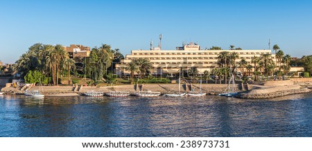 LUXOR, EGYPT - NOV 30, 2014: TOuristic boat over  the river NIle near Luxor. Nile is 6,853 km long. The Nile is an \