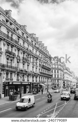 PARIS, FRANCE - JUN 17, 2014: Beautiful architecture of the centre of Paris, France. Paris is one of the most popular touristic destinations in the world