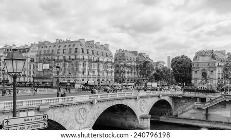 PARIS, FRANCE - JUN 17, 2014: Pont Neuf,  the oldest standing bridge across the river Seine in Paris, France.