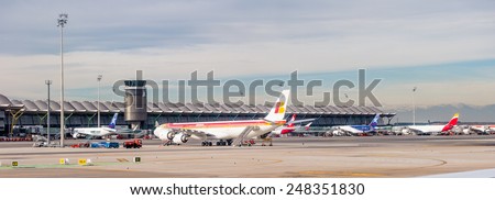 MADRID, SPAIN - JAN 26, 2015: Iberia aircrafts in the Terminal T4 of the Adolfo Suarez Madrid Barajas Airport. Barajas  is the main international airport serving Madrid in Spain.