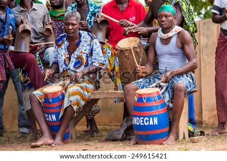 KARA, TOGO - MAR 9, 2013: Unidentified Togolese local musicians play for the people around. People in Togo suffer of poverty due to the unstable econimic situation