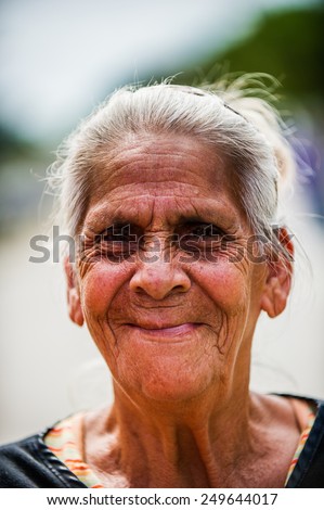 SAN JOSE, COSTA RICA - JAN 6, 2012: Unidentified Costa Rican smiling woman with white hair. 65.8% of Costa Rican people belong to the White (Castizo) ethnic group