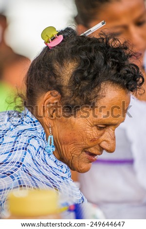 SAN JOSE, COSTA RICA - JAN 6, 2012: Unidentified Costa Rican woman portrait. 65.8% of Costa Rican people belong to the White (Castizo) ethnic group