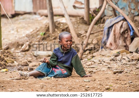 OMO, ETHIOPIA - SEPTEMBER 21, 2011: Unidentified Ethiopian boy in the street. People in Ethiopia suffer of poverty due to the unstable situation