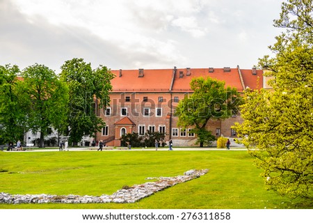 KRAKOW, POLAND - APR 29, 2015: Part of the Wawel Royal Castle in Krakow, Poland. The castle was built at the behest of Casimir III the Great