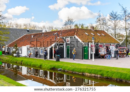 ZAANSE SCHANS, NETHERLANDS - MAY 2, 2015: Nature and houses in Zaanse Schans, Northe Holland, Netherlands. This village is a popular touristic destination in Netherlands