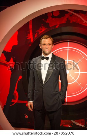 AMSTERDAM, NETHERLANDS - JUN 1, 2015: Daniel Craig as the agent 007 James Bond in Madame Tussauds museum in Amsterdam. Marie Tussaud was born as Marie Grosholtz in 1761