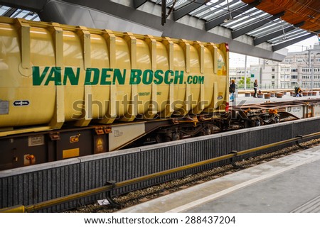 AMSTERDAM, NETHERLANDS - JUN 1, 2015: Train witn Van Den Bosch logo at Amsterdam Bijlmer ArenA metro station. It\'s a  railway station in the Bijlmerme neighbourhood of the Amsterdam Zuidoost stadsdeel